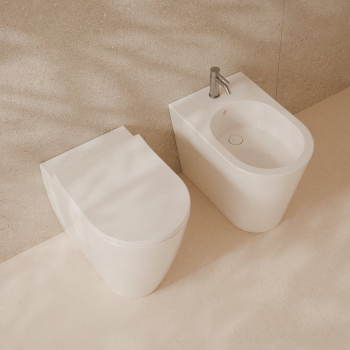 HIDE Round back-to-wall WC with soft-close seat by Alice Ceramica