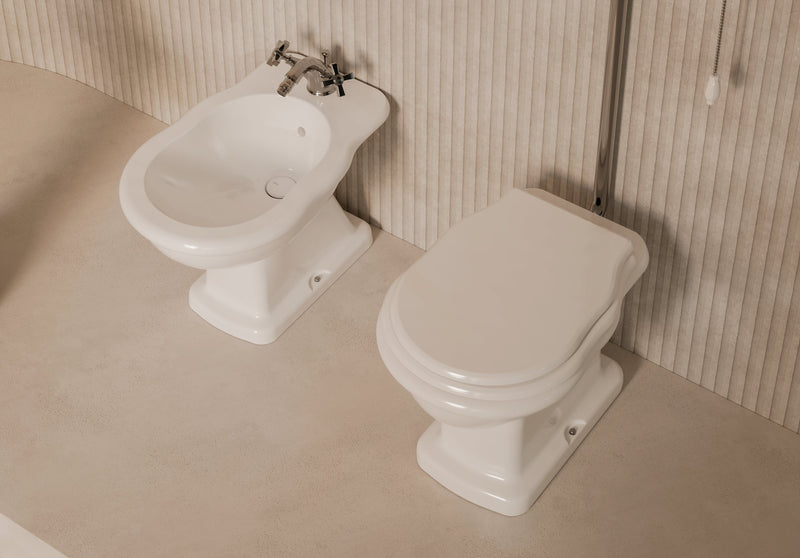 BOHEME High-Level cistern with WC and bidet in a bathroom setting – Alice Ceramica