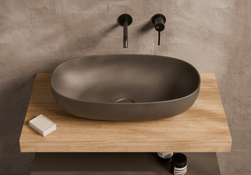 FORM Countertop Washbasin 60x35 H15 in a bathroom setting – Alice Ceramica