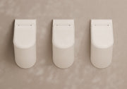 FORM Wall-Hung Ceramic Urinal in a bathroom setting – Alice Ceramica