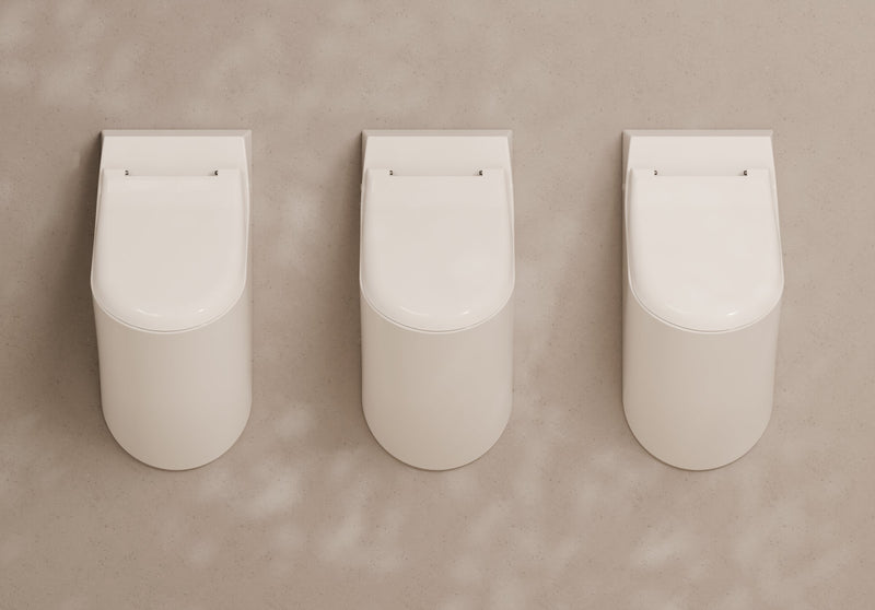 FORM Wall-Hung Ceramic Urinal in a bathroom setting – Alice Ceramica