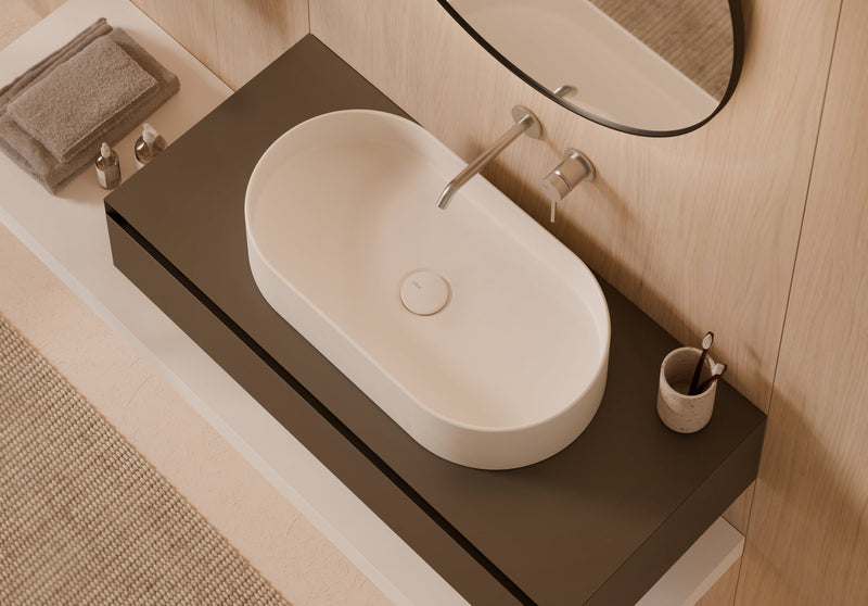 HIDE Stadium Oval Countertop Washbasin in a bathroom setting – Alice Ceramica