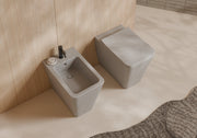 HIDE Square Back-to-Wall WC and bidet 55x35 in a bathroom setting – Alice Ceramica