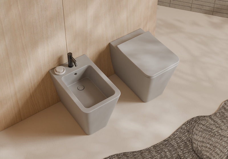 HIDE Square Back-to-Wall WC and bidet 55x35 in a bathroom setting – Alice Ceramica
