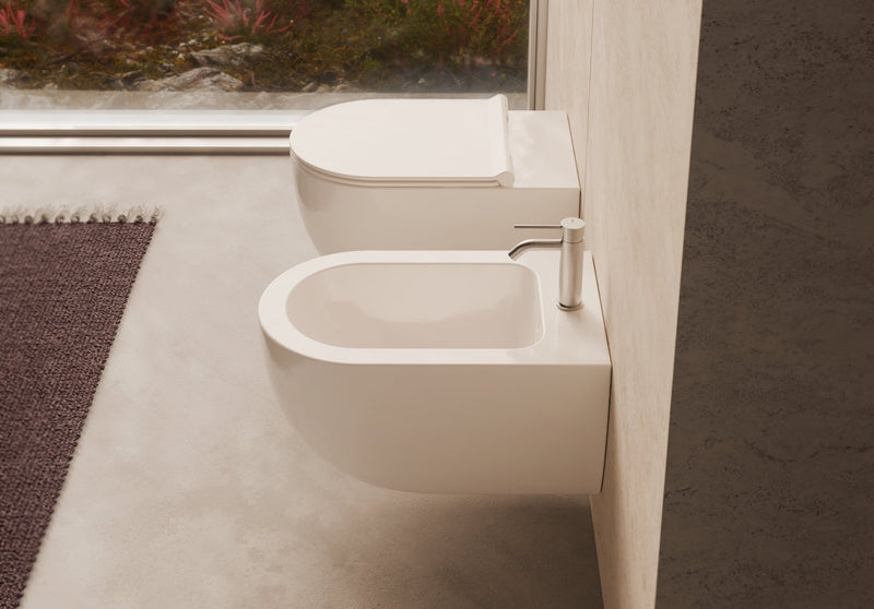 UNICA 55 Wall-Hung WC and bidet in a bathroom setting – Alice Ceramica