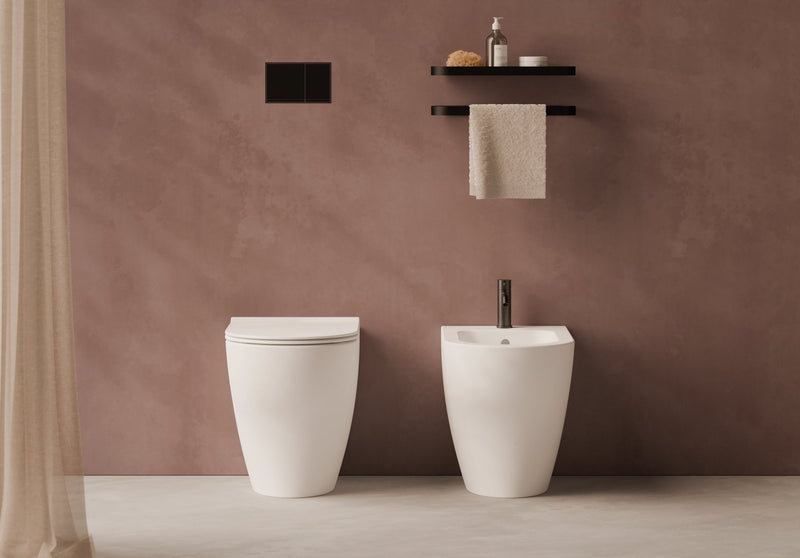 UNICA Back-to-Wall WC and bidet in a bathroom setting – Alice Ceramica